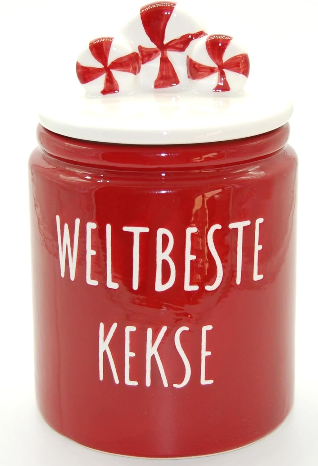 Dekoratives Frontbild Exner Keksdose, Rot mit weißem Schriftzug Vorderansicht der glänzenden, roten Keramik Keksdose von Exner mit dem weißen Schriftzug "WELTBESTE KEKSE" in Großbuchstaben und dem dekorativen Candy-Deckel.