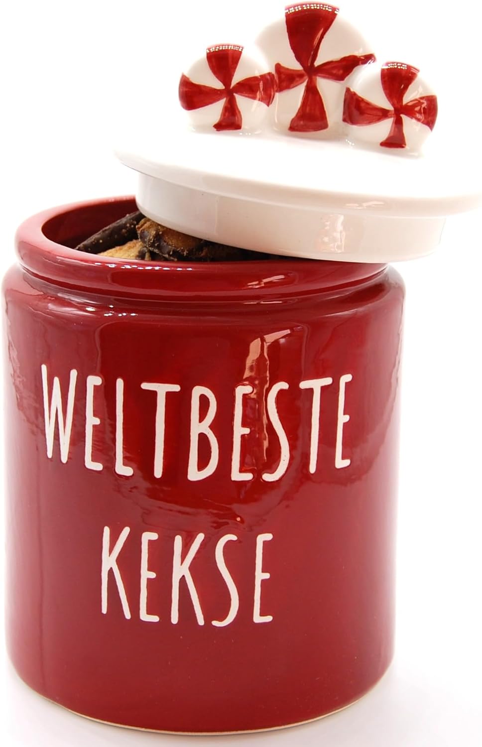 Geöffnete, rote Keramik Keksdose von Exner mit leicht angehobenem Deckel (Candy-Design), der den Blick auf die darin aufbewahrten Kekse freigibt.